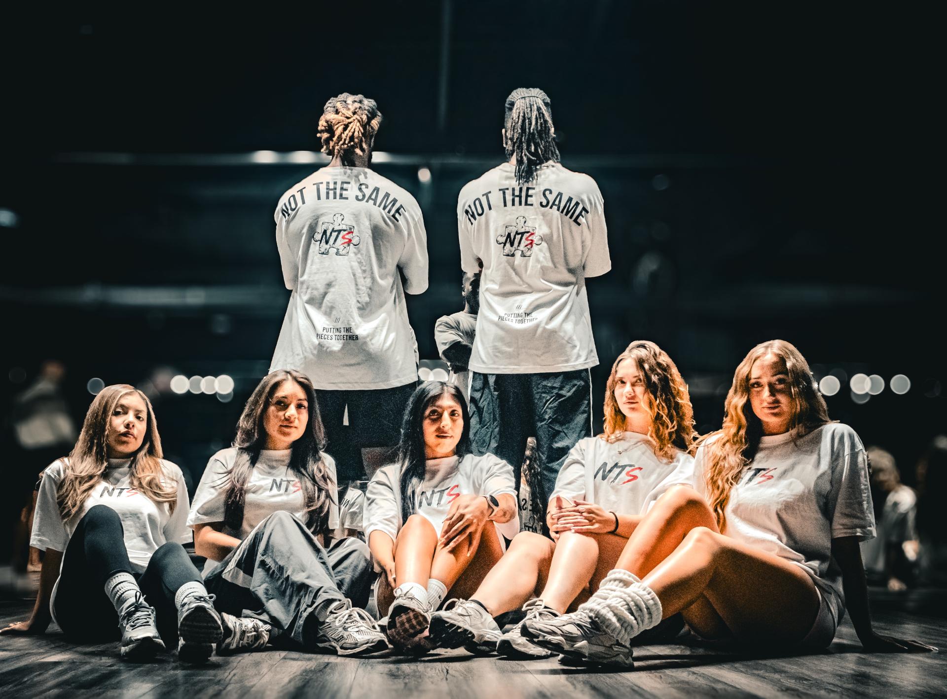 NTS Fitness team in the Not The Same tee, front and back views